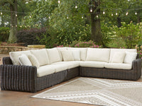 Kimora 7-Piece Outdoor Wicker Sectional Set with Swivel Glider Lounge and Marble-Look Tables